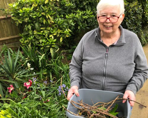 Collecting leaves and flowers to make head wreaths