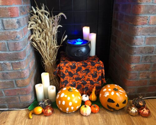 Decorated pumpkins and candles