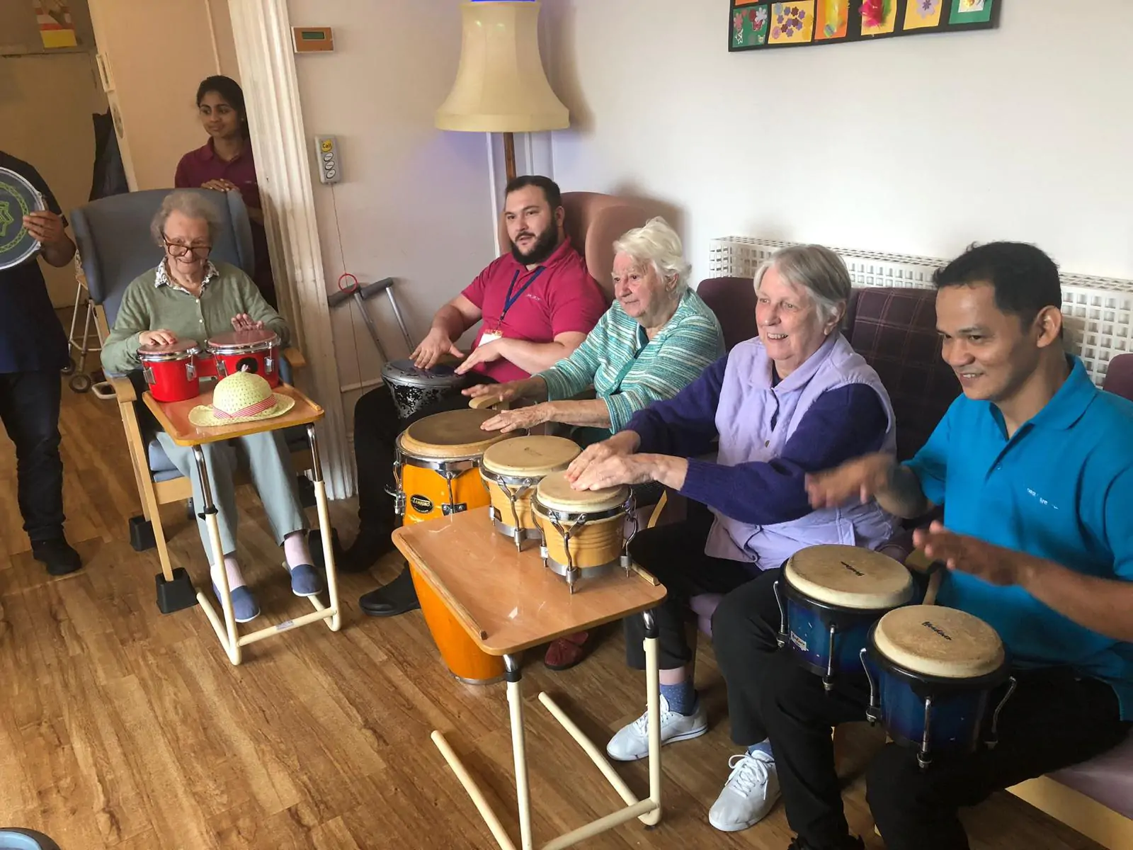 Residents enjoying a drumming workshop