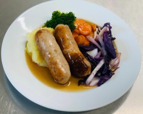 January dinner of sausages and vegetables